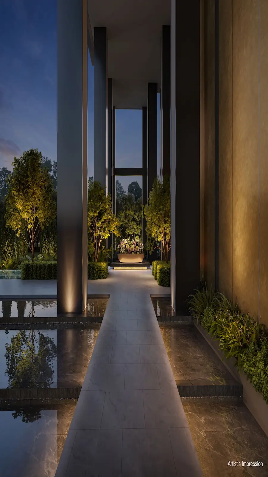 Hudson Place Residences arrival lounge with reflective water terrace and illuminated columns at dusk.