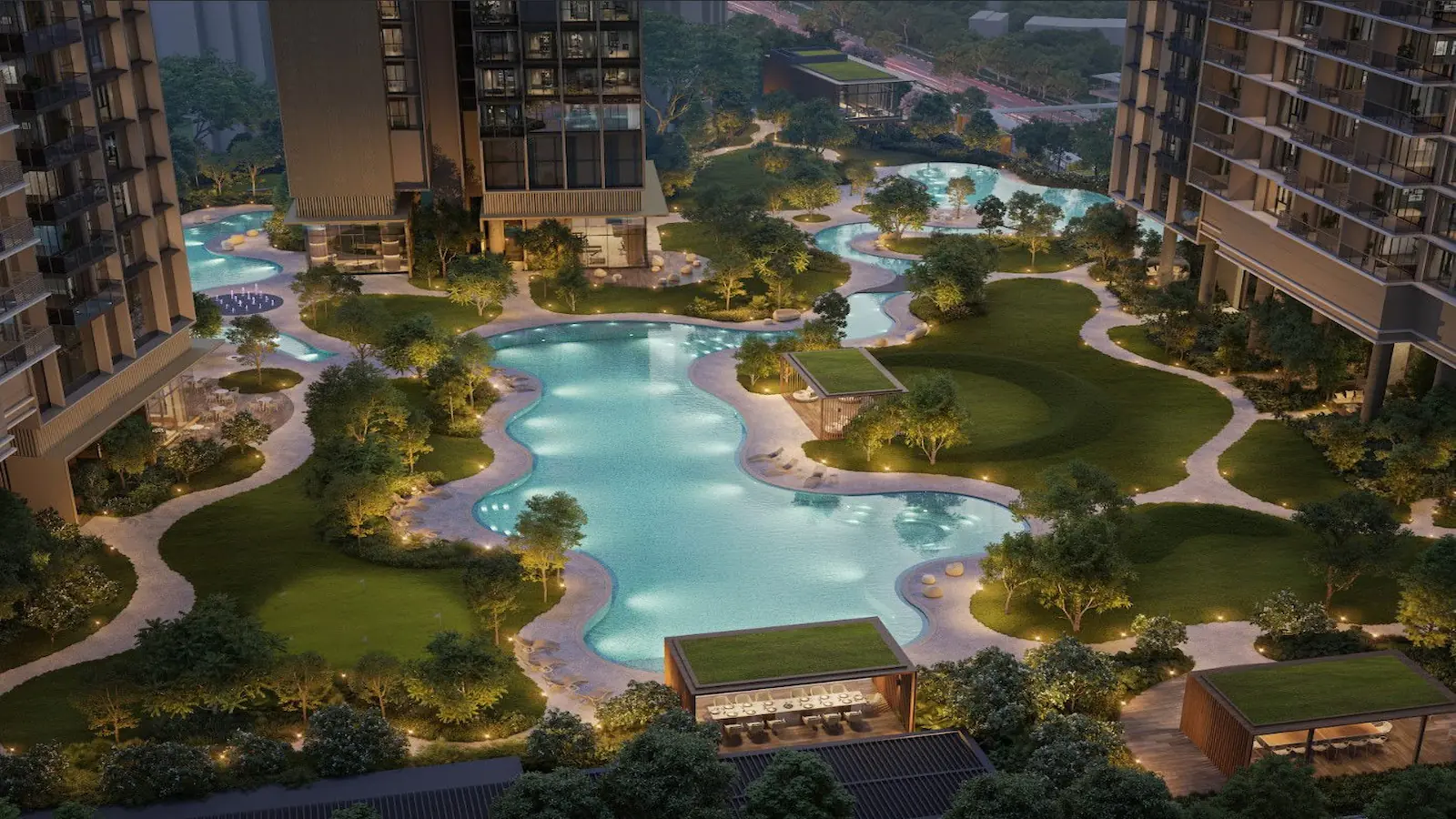 High-angle dusk rendering of the Nava Grove facilities deck, featuring illuminated freeform swimming pools, winding pedestrian pathways, landscaped lawns, and flat-roofed dining pavilions situated between the residential towers.